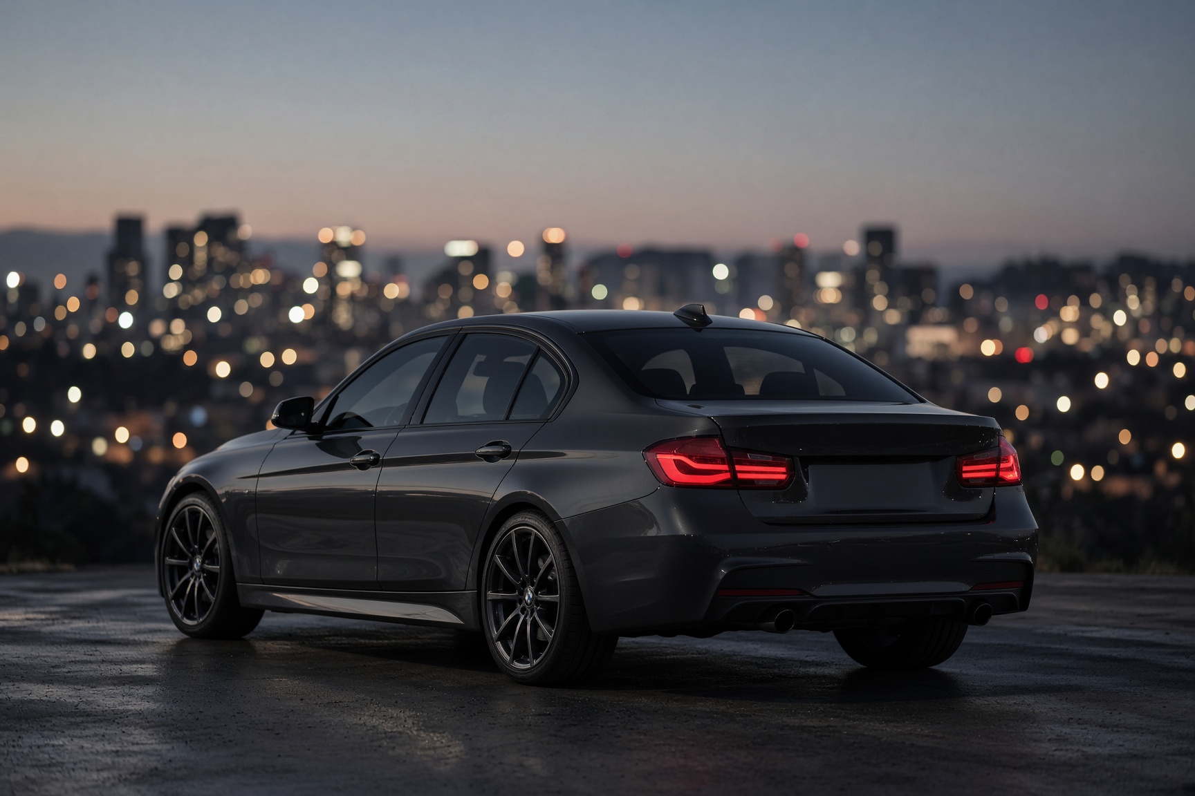 Dark gray BMW sedan with smoked windows