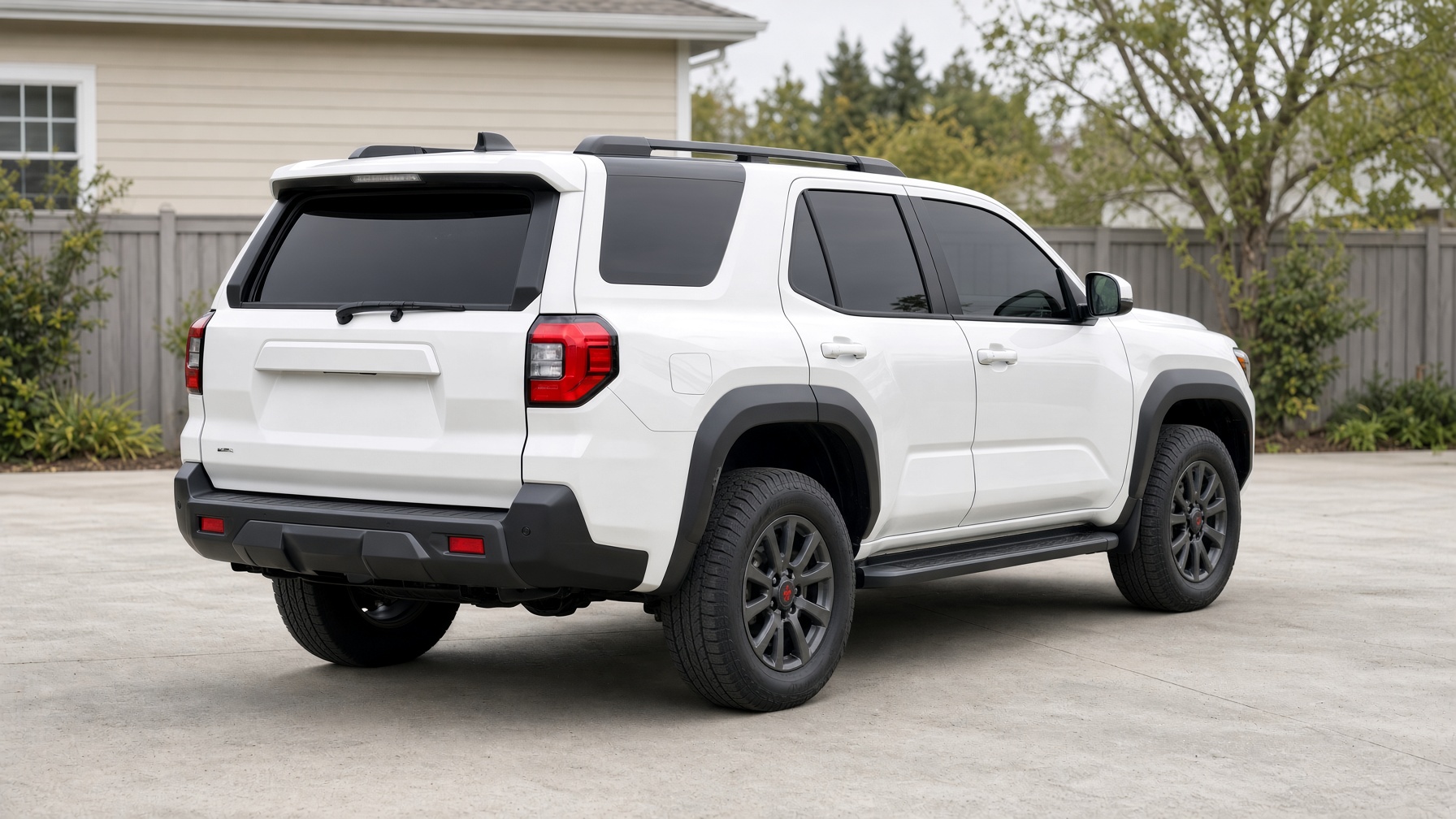 White Toyota 4Runner with dark tint